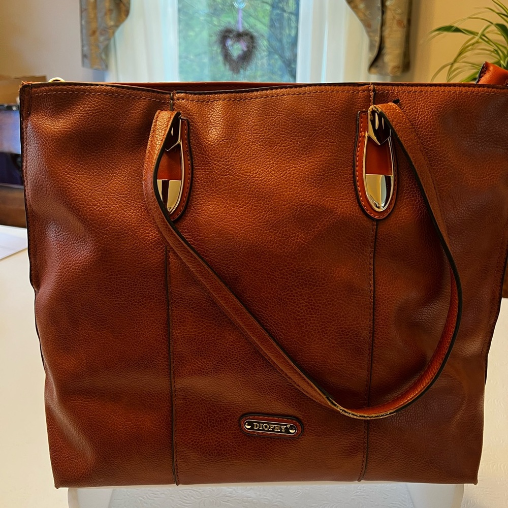 Elegant Brown Leather Tote with Gold Accents
